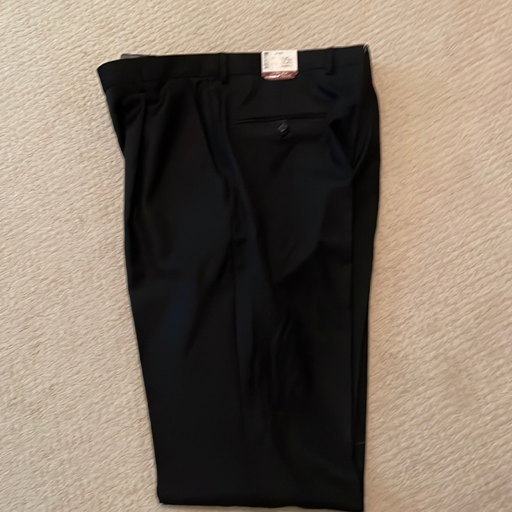 Hickey Freeman dress slacks. 100% worsted wool. Size 34 regular. Never hemmed.